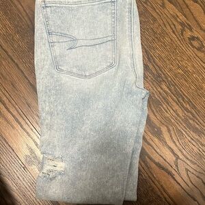Denim Jeans with Distressed Detail